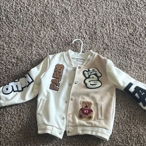 White and Tan Varsity Jacket with Patches